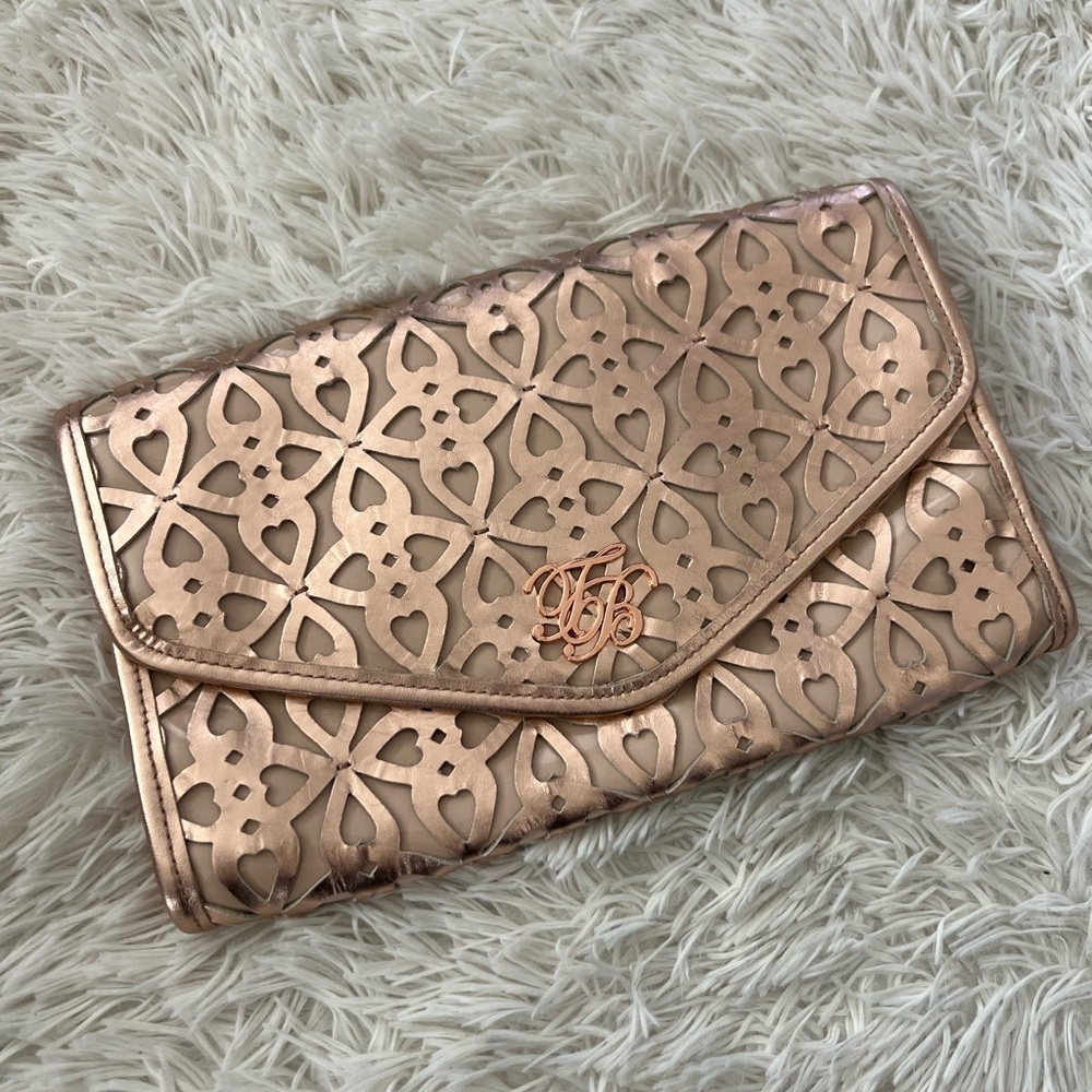 Ted Baker Gold Clutch with Cutout Design